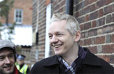 WikiLeaks founder Julian Assange speaks to the media outside Beccles police station in Suffolk, England