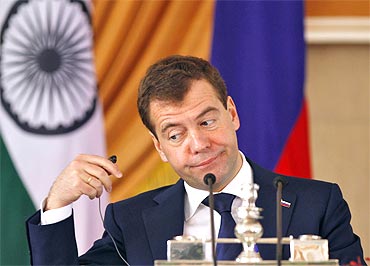 President Medvedev attends a joint news conference with PM Singh in New Delhi on Tuesday