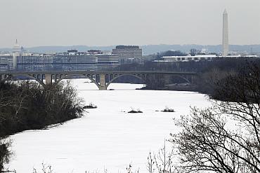 The frozen Potomac River is blanketed with snow in Washington