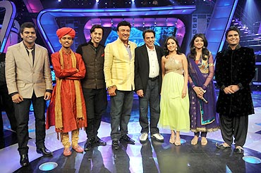 Sreeram, left,  with Bollywood legend Dharmendra, judges of the show, and other contestants