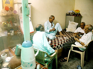 Seniors at Gharaunda, a charitable old age home on the outskirts of Delhi, play cards