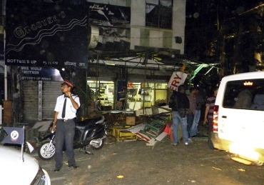 Investigators at the site of the blast in Pune