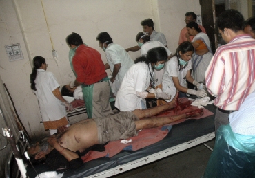 An injured victim being treated at a Pune hospital