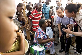 UN Secretary-General Ban Ki-moon speaks with Haitians displaced by the earthquake.