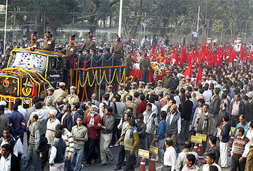 Thousands follow the body of Jyoti Basu during a procession in Kolkata on Tuesday