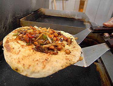 A kathi roll in the making in Kathi Rolls by Kabab Factory in New York