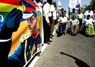 Physically disabled former soldiers and veterans attend a rally in the streets to support presidential candidate Sarath Fonseka in Colombo