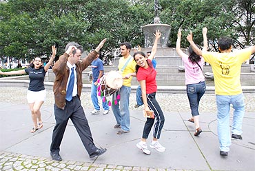 Youths dance to the beats of traditional Punjabi-folk Bhangra in New York