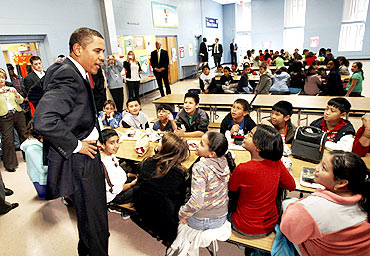 Obama greets third and fourth grade students at a school in Maryland