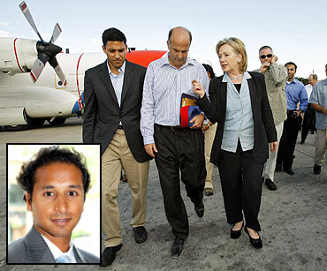 Clinton with US Aid Administrator Rajiv Shah at the Port-au-Prince airport and (inset) Dino Teppara