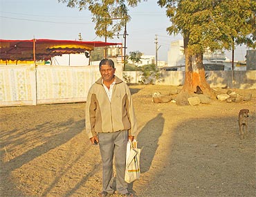 All alone: Bharat Soni, the neem tree and a stray dog at the 'memorial park'
