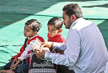 Harilal Kapdi with his children at the prayer venue