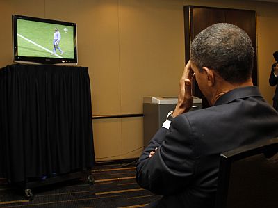 US President Barack Obama watches a live telecast of the 2010 World Cup soccer match between the US and Ghana during a short break between bilateral meetings with South Korea's President Lee Myung-bak and China's President Hu Jintao at the G20 Summit in Toronto on June 26, 2010.