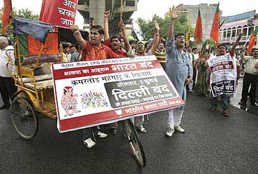 BJP activists shout slogans during a strike against the hike in fuel prices in New Delhi