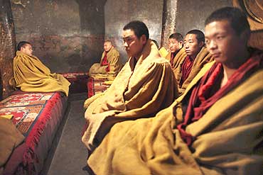 Tibetan monks inside a monastery