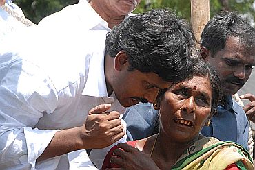 File photo of Jagan speaking to flood victims in Andhra Pradesh