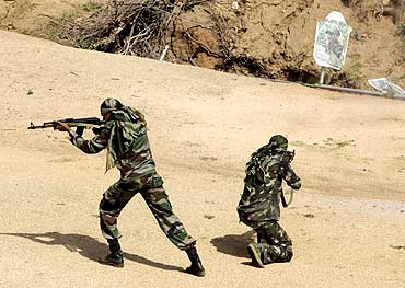 Security personnel train at a jungle warfare school in Kanker, Chhattisgarh