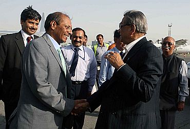Krishna bids good bye to Indian Ambassador in Afghanistan Gautam Mukhopadhyay in Kabul airport on Tuesday