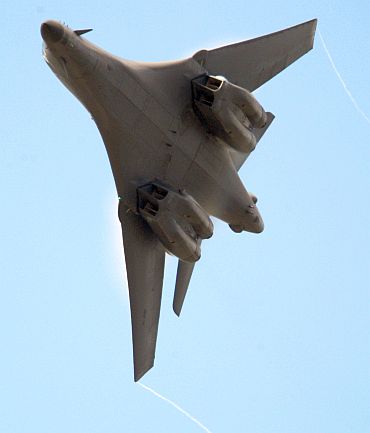A Boeing B1-B bomber makes a manoeuvre on the second day of the airshow