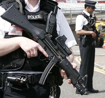 Policemen patrol the streets of London