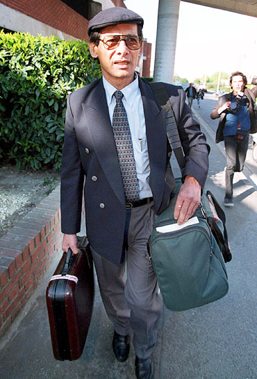Sobhraj leaves the lawcourt of Bobigny in the Paris suburb in 1997