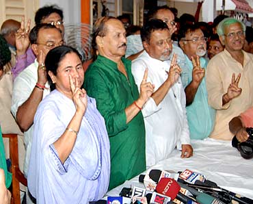 Trinamool Congress chief Mamata Banerjee and party leaders celebrate their victory