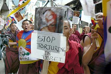 Tibetan monks protest the Chinese crackdown in Lhasa