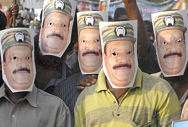 Protesters wear masks of slain LTTE chief Vellupillai Prabhakaran at a rally against Sri Lanka's President Mahinda Rajapaksa in Chennai on May 28, 2009