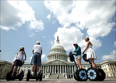 A group of tourists take a guided tour of Capitol Hill in Washington