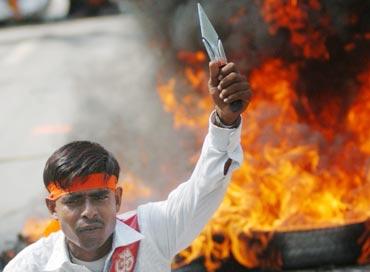 A Bajrang Dal activist attends a protest rally in Lucknow