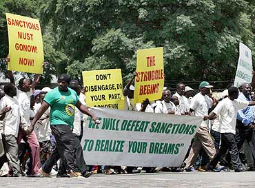 Supporters of the Zimbabwe ruling party protest against European Union's economic sanctions