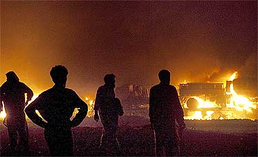 A convoy, which was carrying supplies to NATO forces in Afghanistan, was set ablaze near Islamabad