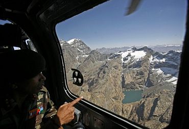 An unidentified Indian general makes an aerial survey near the LoC