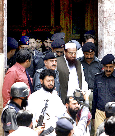 Hafiz Saeed, chief of the banned Jamaat-ud-Dawa and LeT founder, outside a Lahore court.