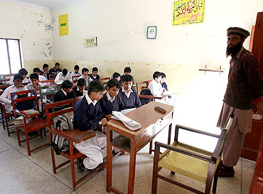 Students at a school at the Jamaat-ud-Dawa charity's headquarters, in Muridke near Lahore