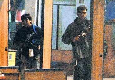 Ajmal Kasab and Abu Ismail leave CST after their murderous rampage