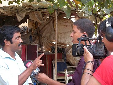 Eknath Omble, brother of slain constable Tukaram Omble who nabbed Kasab, talks about the verdict with a private news channel. Talking to rediff.com, he said: 'I thank Rakesh Maria (Mumbai top cop) and Ujjwal Nikam (special public prosecutor in the 26/11 case) for this. But the verdict must be carried on immediately.'