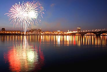 Fireworks explode above the Yenisei River