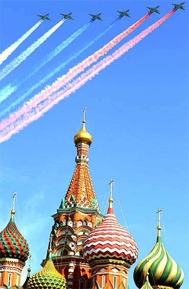 A group of Russian military jets fly over St Basil's Cathedral