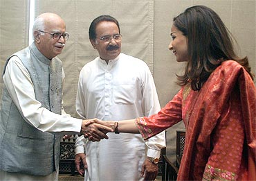 BJP leader L K Advani with PPP leader Sherry Rehman in Islamabad