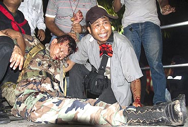 General Khattiya Sawasdiphol moments after being shot