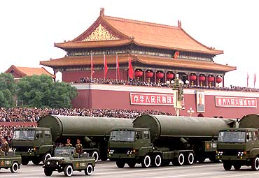 Chinese-made Dong Feng-31 intercontinental ballistic missiles pass through Tiananmen Square
