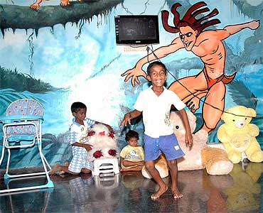 Children play at the toddlers' room in Anada Illam