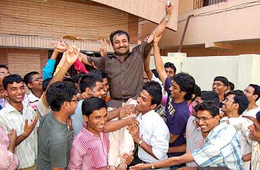 A jubilant Super 30 group with teacher Anand Kumar