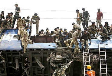 Army and police personnel participate in rescue operations