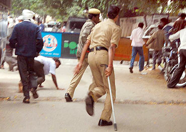 Police chase away pro Telangana protestors in Hyderabad on Monday