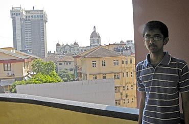 Juzer with the Taj Mahal hotel, where the Obamas will stay, clearly visible from the school