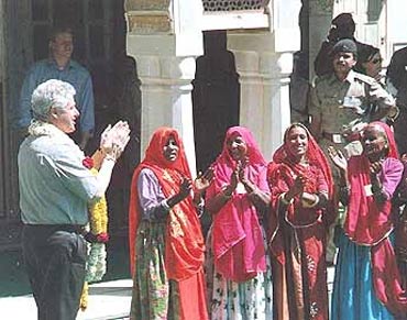 File photo shows President Clinton with Rajasthani women