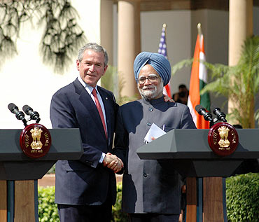 File photo shows Prime Minister Dr Manmohan Singh with US President George W Bush