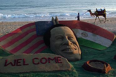 A sand sculpture of U.S. President Barack Obama on a beach in Puri